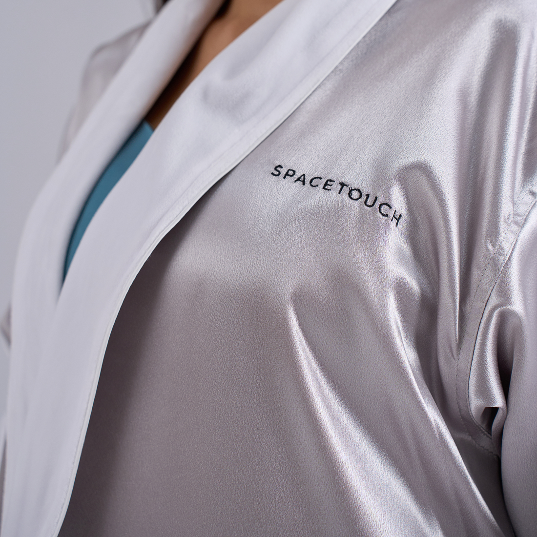 SPACETOUCH embroidery on grey satin